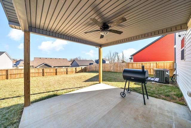 view of patio with ceiling fan, a grill, and central AC unit