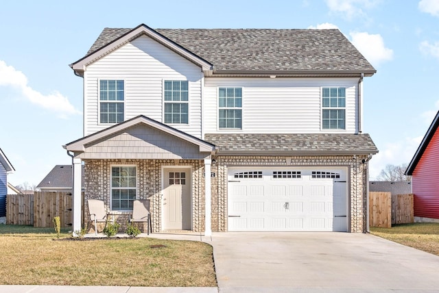 front of property with a garage and a front lawn