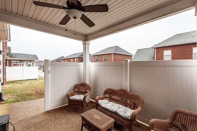 view of patio / terrace featuring ceiling fan