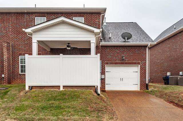 exterior space with a lawn and ceiling fan