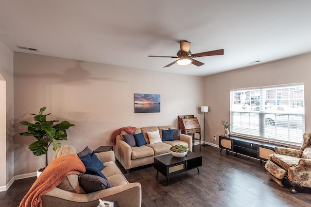 living room with dark hardwood / wood-style floors and ceiling fan