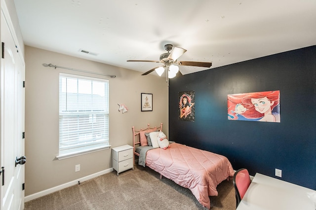 carpeted bedroom featuring ceiling fan