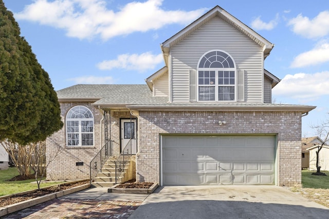 view of front of property featuring a garage