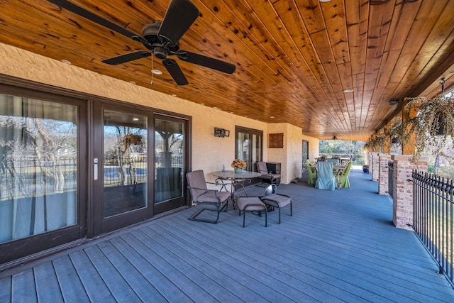 wooden terrace with french doors and ceiling fan