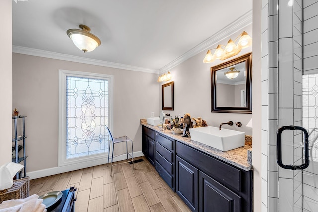 bathroom with hardwood / wood-style flooring, crown molding, and plenty of natural light