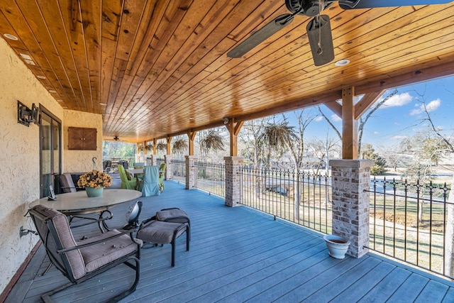 wooden deck with ceiling fan