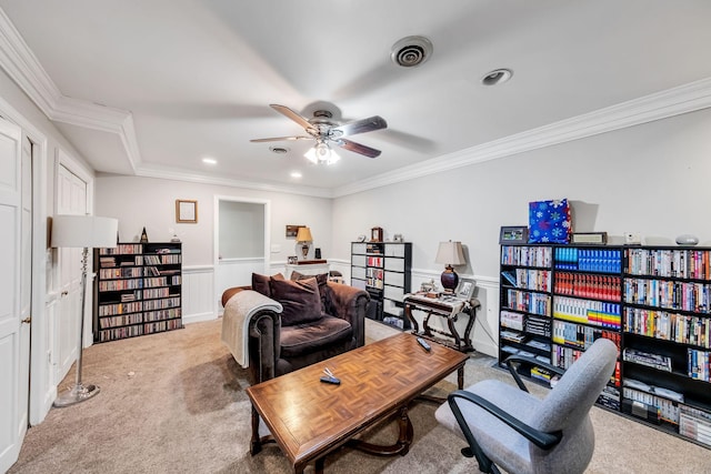 interior space featuring ornamental molding, carpet, and ceiling fan