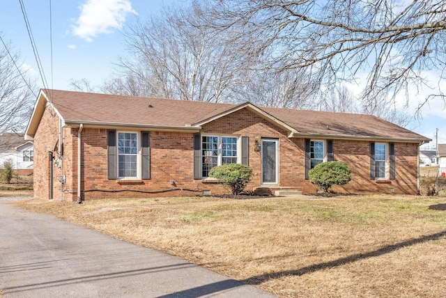 ranch-style house with a front yard