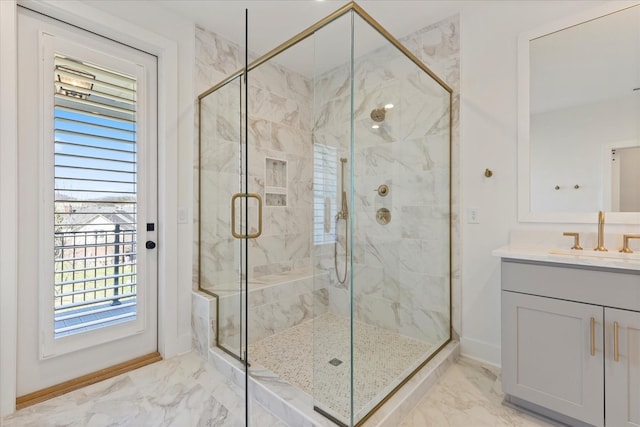 bathroom featuring vanity and walk in shower