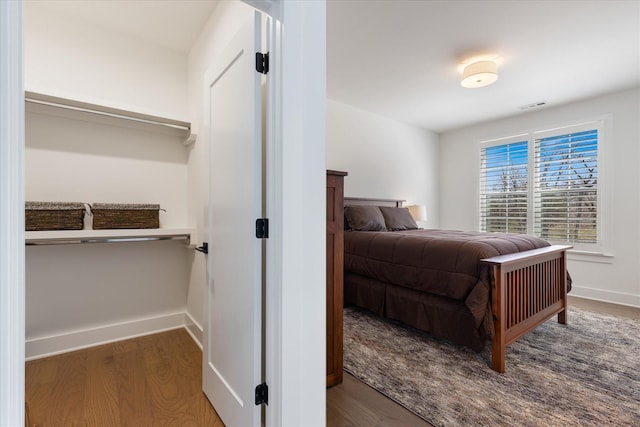 bedroom with wood-type flooring