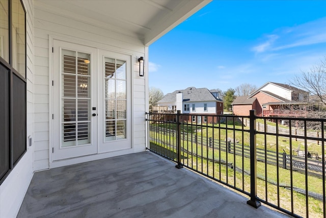 balcony featuring french doors