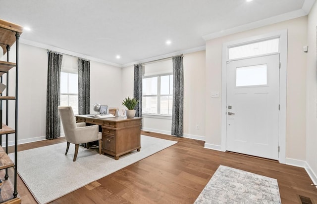 office featuring ornamental molding and hardwood / wood-style floors