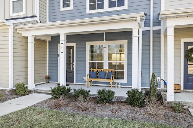 entrance to property with a porch