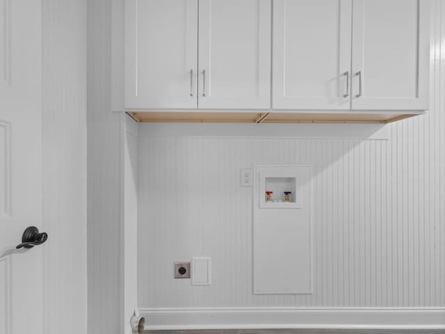 laundry area featuring cabinets, electric dryer hookup, and washer hookup