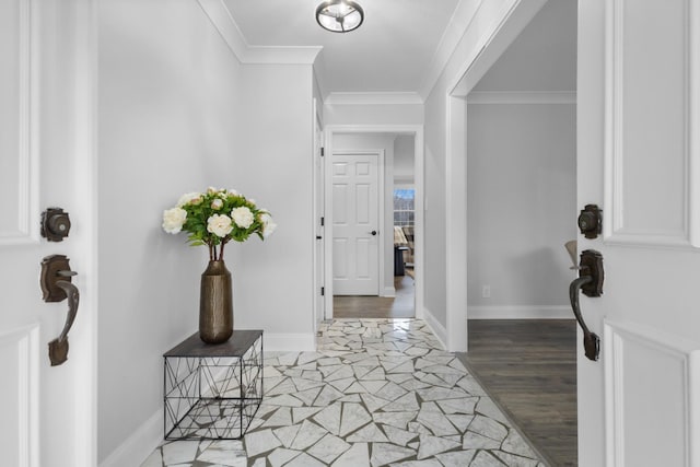 foyer entrance featuring hardwood / wood-style flooring and ornamental molding