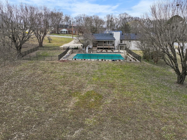 view of pool with a yard and a deck