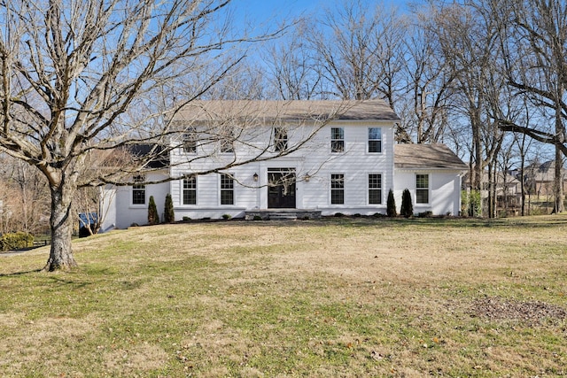 view of front facade with a front yard