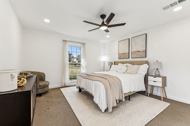 bedroom with ceiling fan and carpet flooring