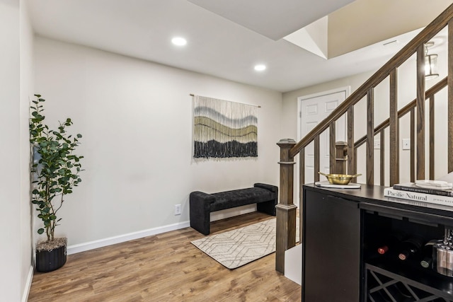 entryway featuring wood-type flooring and beverage cooler