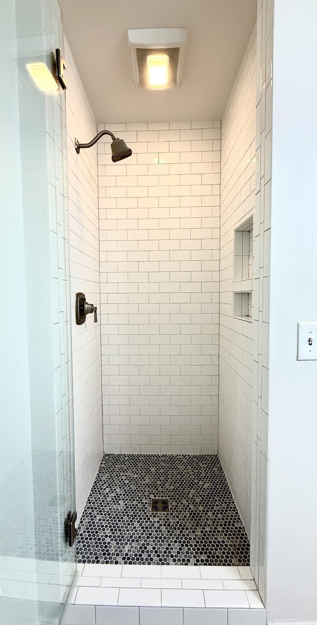 bathroom featuring walk in shower