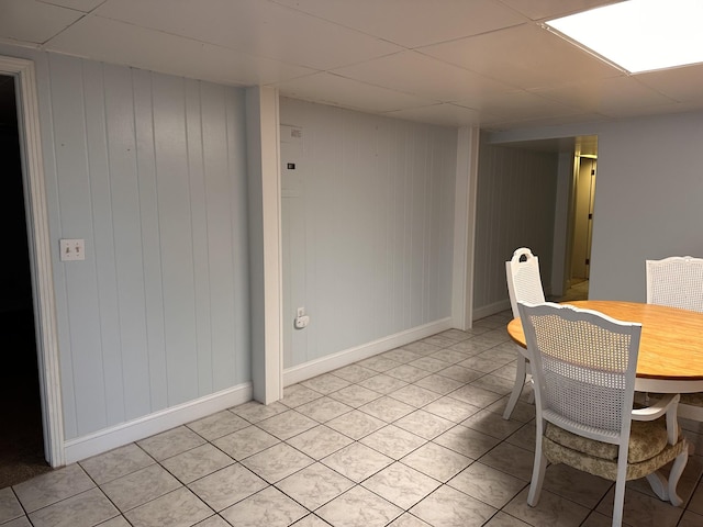 dining space featuring a paneled ceiling