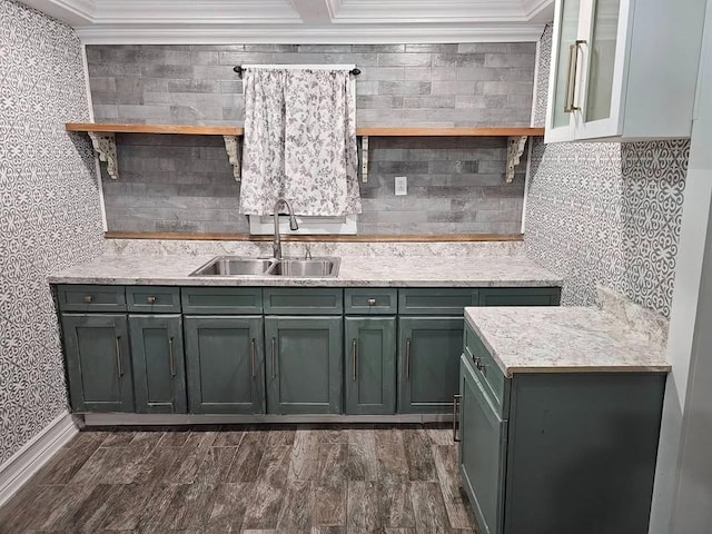 kitchen with tasteful backsplash, sink, dark wood-type flooring, and ornamental molding