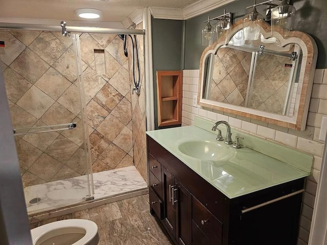 bathroom with toilet, an enclosed shower, ornamental molding, vanity, and decorative backsplash