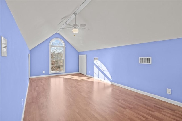 additional living space with ceiling fan, lofted ceiling, and light hardwood / wood-style floors