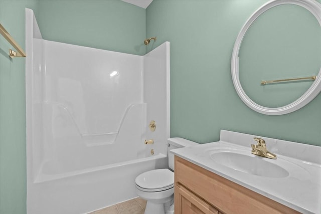 full bathroom featuring vanity, toilet, bathing tub / shower combination, and tile patterned flooring