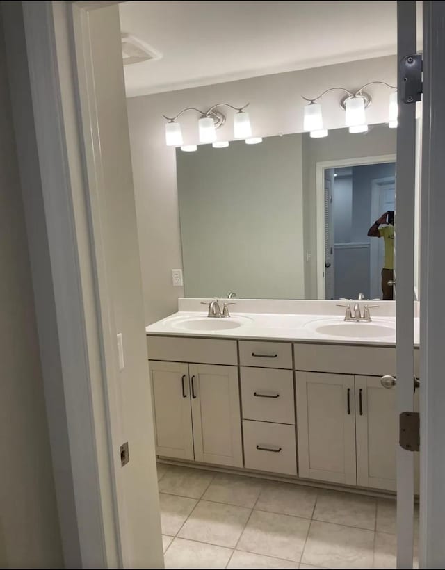 bathroom featuring vanity and tile patterned flooring