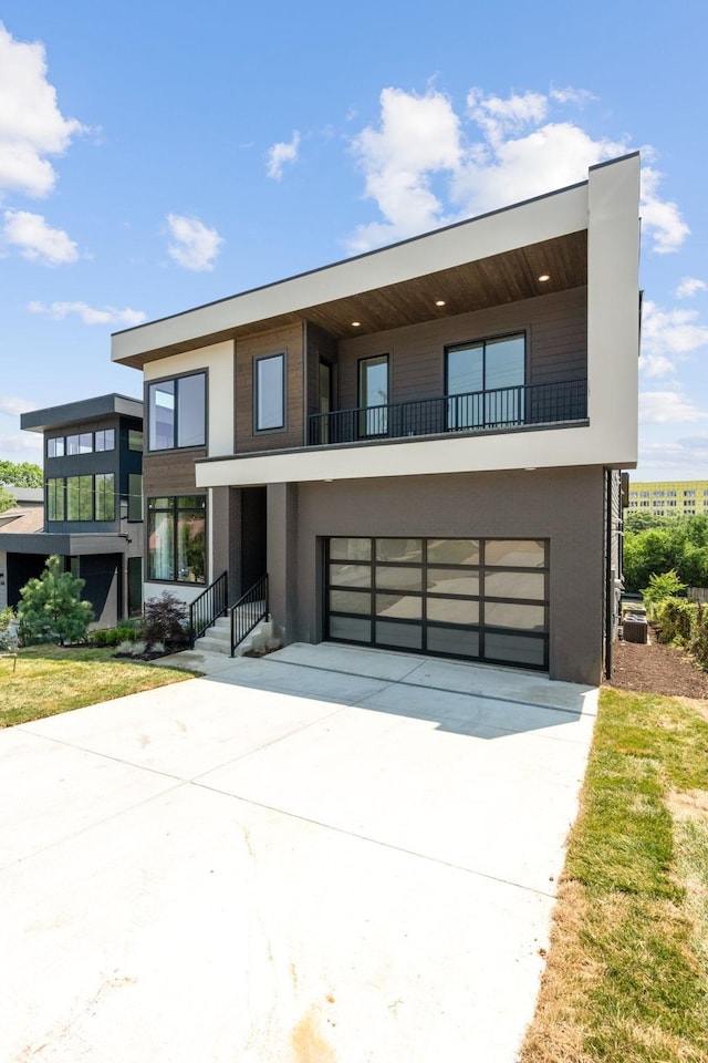 modern home featuring a garage