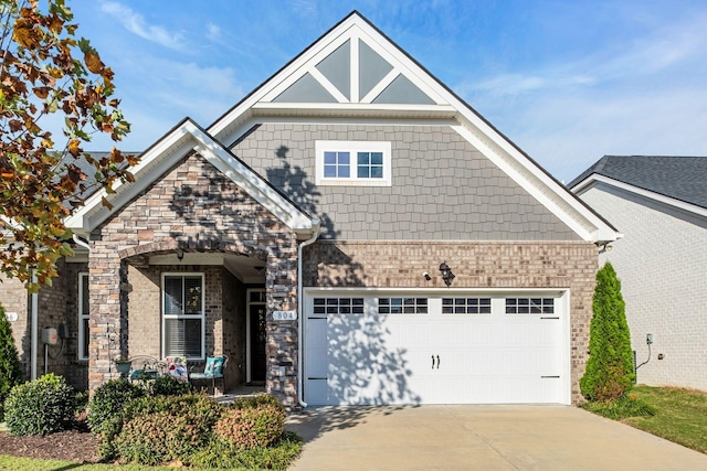 craftsman-style house featuring a garage