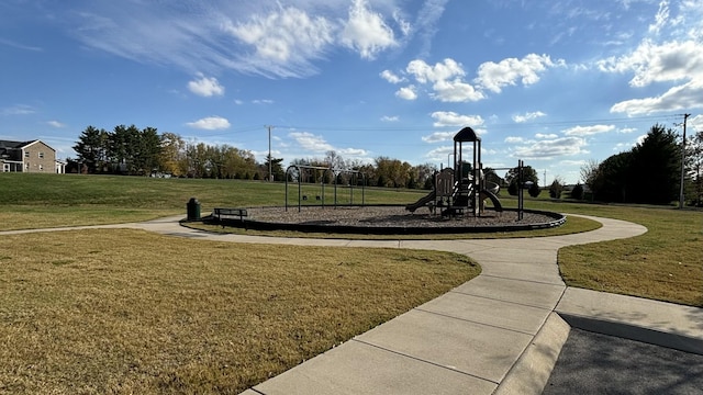 view of play area featuring a lawn