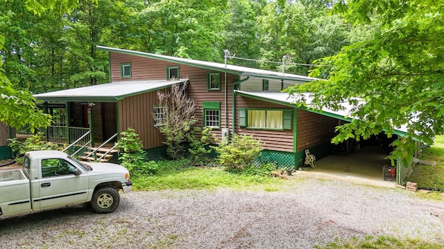 view of front of house with a carport