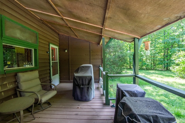 wooden deck featuring grilling area