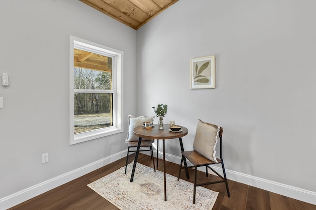 interior space featuring wooden ceiling and dark hardwood / wood-style floors