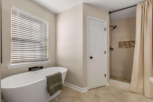 bathroom with independent shower and bath