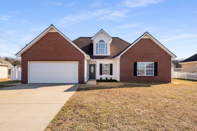 front facade featuring a garage and a front lawn