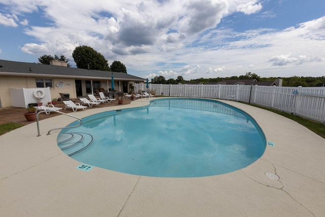 view of pool featuring a patio area
