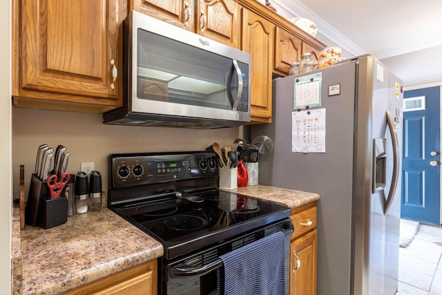 kitchen featuring crown molding and appliances with stainless steel finishes
