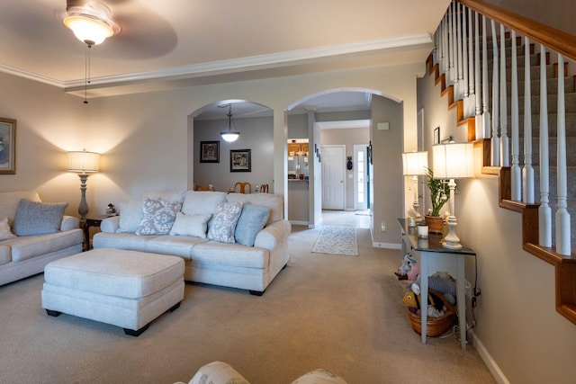 living room featuring crown molding and light colored carpet