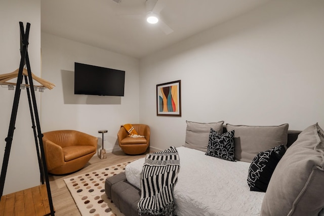 bedroom featuring ceiling fan and light wood-type flooring