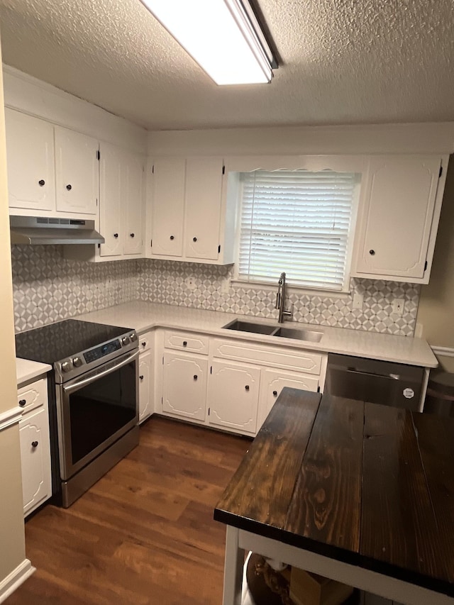 kitchen featuring white cabinetry, stainless steel electric stove, sink, and dark hardwood / wood-style floors