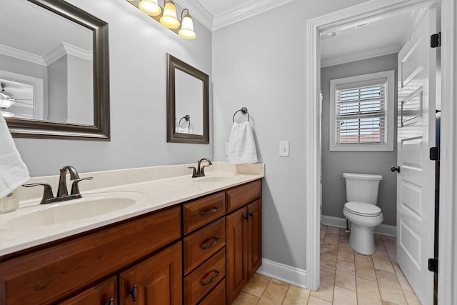 bathroom featuring ornamental molding, vanity, ceiling fan, toilet, and tile patterned floors