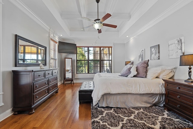 bedroom with hardwood / wood-style flooring, ornamental molding, coffered ceiling, and beamed ceiling