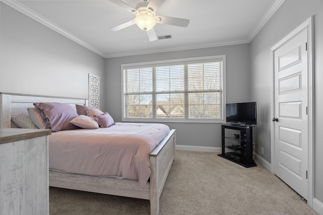 carpeted bedroom featuring crown molding and ceiling fan