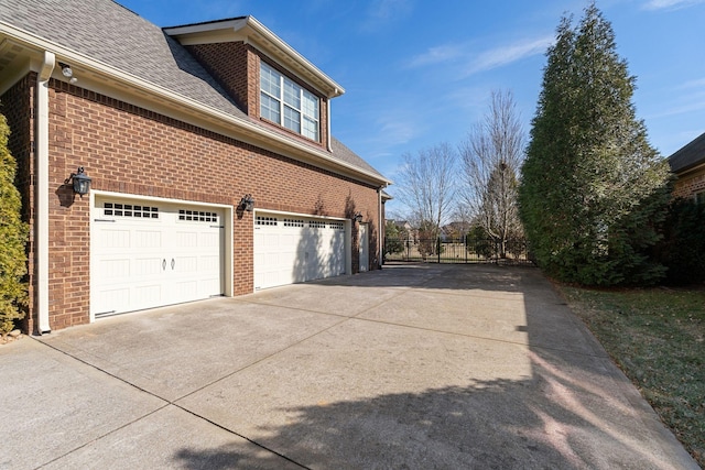 view of property exterior with a garage