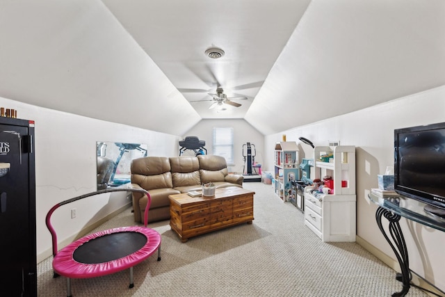 living room with lofted ceiling, light colored carpet, and ceiling fan