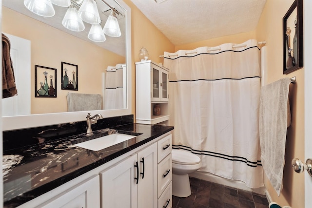 full bathroom featuring vanity, a textured ceiling, toilet, and shower / bathtub combination with curtain