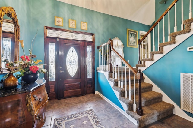 entrance foyer with tile patterned floors